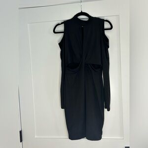 Sexy black cutout dress. NWT